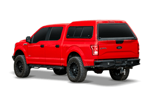 Red F150 with a Mid-Rise truck cap